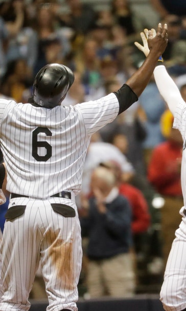Woodruff fans 10, Brewers' bats shine in 10-4 win over Bucs